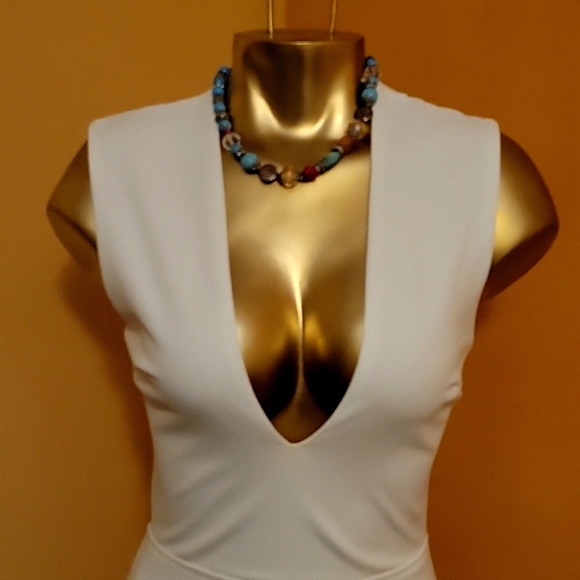 LULU'S THINKING OUT LOUD WHITE CUT-OUT JUMPSUIT. SIZE SMALL. - Picture 10 of 11